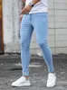 Мужские джинсы 2023 Мужские эластичные узкие мужские дизайнерские эластичные джинсовые брюки-карандаш с царапинами Уличная одежда Небесно-голубая мода 231110