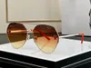 Fashion carti luxury Cool sunglasses Designer Womens popular police eyewear peach shaped lenses metal bear carved decoration gold polished frame mens low profile