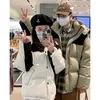 Kvinnors dikerockar 2023 Vinterbomullspadlad jacka Kort huva färgmatchande koreanska lösa förtjockade par mäns och kvinnliga outwear