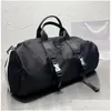 NNB Duffel Çantalar En Kalite Unisex Duffle Bag Sport Fashion Siyah Ticaret Büyük Kapasiteli El Çantası Düz ​​Renk Naylon Taşınabilir Seyahat Dhgji