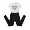 Dames tracksuits ontwerper tweedelige set letter afdrukken kale navel navel sexy short mouw t-shirt short shorts casual sport round nek outfits massief jogging pak