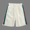 Designer Nya kvinnor T -skjorta Skjorta Takklass Casual Guard Pants Double Red Green Standed Nylon Shorts