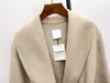 Cappotto di lana di media lunghezza con cintura in lana double face da donna Toteme
