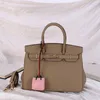 Designer 2024 Platinum Top Bag Layer Cowhide Lychee Patroon Gekleurde Fun Fun's Handtas Trendy Schouder