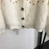 Designerski sweter Khaki w szyku w szyku w szyku w dniu dekoltu Temperament długowy rękaw jesienne krawędzi Kurtka damska Kurtka damska