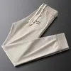 Pantalons de créateur de mode pour hommes, printemps et automne, nouveaux gardes brodés haut de gamme, marque tendance, beau pantalon de sport décontracté de luxe