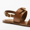 Sandaler 2023 Summer äkta läderkvinnor guldspänne gladiator för brun kohud platt kvinna