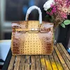 Designer Fashion Platinum Sac 2024 Top à tendance polyvalente Calque de vache Crocodile Crocodile Backbone Match Portable Big