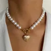 Girocollo IT Collana di perle vintage per le donne Moda Estate Bianco Imitazione Collane Tendenza Eleganti gioielli da sposa