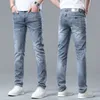 Herr jeans vår sommar tunt denim smal fit europeisk amerikansk high-end märke små raka byxor qk9912