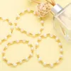 Bracelet perlé brin perles croix mode minimaliste polyvalent tissé à la main extensible bohème perle de riz