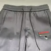 Sonbahar Kış Son Marka Erkek Pantolon Yüksek Kaliteli İpek Pürüzsüz Elastik Jogger Sweetpants Highend Lüks Top Tasarımcı Pantolon