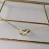 Designe Double bague pendentif en or pour femmes hommes tendance diamant designer bijoux de mode fête de Noël mariage cadeaux de mère vente d'anniversaire filles cool avec boîte
