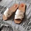Tasarımcı Woody sandalet Katır düz slaytlar Kadınlar Açık ten rengi bej beyaz siyah pembe Yazı Kumaş kanvas terlik parmak arası terlik lüks yaz açık ayakkabı