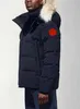 Canada Giacche Uomo Donna Vera pelliccia di coyote All'aperto Wyndham Giacca a vento Designer Jassen Capispalla Con cappuccio Fourrure Manteau Giù Cappotto Hiver Parka