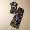 Europäische und amerikanische Damenbekleidung 2023 Sommerneues ärmelloses Knopfhemd Blumenbedruckte Hose mit weitem Bein Modeanzug