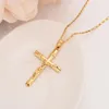 Collier croix en or charmes