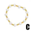 Bracelet perlé brin perles croix mode minimaliste polyvalent tissé à la main extensible bohème perle de riz