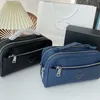 2023DESIGNER COSMETIC BAGSファッションメイクアップバッグ女性デザイナートイレトリー旅行ポーチレディース