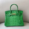 Sac à la main le designer fait à la main Platinum 2024 Crocodile Bone Match Real Women's Vache Lock Backle Fashion Fashion Hands Sac à main