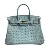 Sac à la main le designer fait à la main Platinum 2024 Crocodile Bone Match Real Women's Vache Lock Backle Fashion Fashion Hands Sac à main