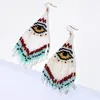 Dangle Earrings Beaded Tassel Eye Originality Hand Knitting Bohemia Alloy Individuality Fashion Design Simple Rice Bead