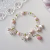 Urok bransoletki moda różowy kwiatowy liść bransoletka modna lilia dolinę motyla serdeczne perłowe koraliki dla kobiet żeńska biżuter ślubna