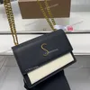 女性デザイナーブラックホワイトスプリットサンセットフラップバッグ熟成金色の手紙メタルハードウェアチェーンマルチポッシュ22x14cm豪華なクロスボディショルダーハンドバッグ財布