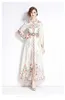 Grundläggande avslappnade klänningar 2024 Spring Autumn Runway Women's Stand Collar Long Lantern Sleeve Floral Print Single Breasted Belt Holiday Boho Maxi Robes