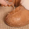 Zapatillas de diseñador Castaño Merino Piel de oveja Pelo Tazz Botas para la nieve Mujeres Hombres Zapatillas Tasman Cálido Ante Confort Otoño Invierno Botas ugglie