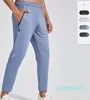 Pantalons longs de jogging pour hommes Tenue de yoga de sport Séchage rapide Cordon de serrage Poches de sport Pantalons de survêtement Pantalons pour hommes Taille élastique décontractée Couleurs de fitness