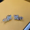 2023 Nya kvinnor Fashion Studs smycken guld/silver dubbla blommaörhängen prinsessa söt diamant ins populära stud bröllop blommor örhänge gåva