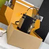 디자이너 버킷 백 럭셔리 배럴 가방 10A 미러 품질 배럴 형태의 숄더 가방 캔버스 크로스 바디 백 진짜 가죽 핸드백이있는 박스 L136