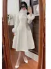 Pelliccia sintetica da donna 2023 Inverno Donna Vintage Cappotti di lana stile cinese Lady Elegante doppio petto Cappotto lungo colletto bianco femminile A-line 231110