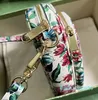 Sac à main de styliste en cuir de vache véritable, motif imprimé de fleurs, fermeture éclair, ouvert, pochette de qualité supérieure