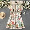 Grundläggande avslappnade klänningar Nya 2024 Spring Fashion Runway Dress for Women Shirt Collar Long Lantern Sleeve Floral Print Elegant Belt Holiday Boho Robe Vestidos