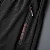 Pantaloni da uomo Estate Maglia traspirante Pantaloni sportivi neri Pantaloni da uomo Pantaloni sportivi Pantaloni larghi Pantaloni casual da uomo 7XL 8XL 9XL W0411