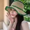 Chapeaux à large bord 2023 Chapeau de paille tissé coréen Femme creuse respirante anti-ultraviolet soleil d'été bord de mer polyvalent pliable chapeau de seau
