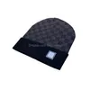 Модельерские шапки мужские и женские бобовые осень/зима теплые вязаные лыжные бренды высокого качества клетчатые роскошные термо-доставки Dhm1X