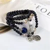 Perles de pierre de sable bleu naturel à brin avec cuivre Bouddha Pendre Flower Spacer Multi Circle Bracelet Fashion Women's Accessoires