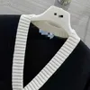 Tricots pour femmes T-shirts concepteur noir blanc couleur contrastée cardigan 2023 printemps nouveau style sexy col en V court simple boutonnage en tricot BZ1C