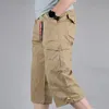 Herr shorts sommarlång längd last män overaller bomull multi ficka byxor byxor taktisk militär plus storlek 5xl 230410