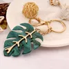 Red Palm leaf Keychain Christmas Green Leaf Metal Keychain Beautiful and Fresh Foliage Shape Key Ring Festival Gift Ladies Accessories Airpods Bag Pendant