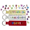 Other Wholesales Price 10Pcs Pu Leather Key Chain With 8Mm Small Belt Can Through Slide Charm /Letters Drop Delivery Jewelry Dhgarden Dhwk2