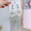 Kolczyki Dangle Fashion Flower Long 2023 modne wzory bohemia ręcznie robiona płatka perel frędzla dla kobiet prezent