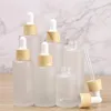 Bottiglie di stoccaggio Vasetti 20ml 30ml 40ml 50ml 60ml 80ml 100ml Flacone contagocce satinato con coperchio in bambù Pipetta Olio essenziale Vuoto232g