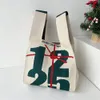 Evening Bags Fashionable Christmas handbag Handmade knitted Womens Knot wrist bag Smal shopping Reusable 231110