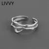 Ringas de banda Livvy color prateada irregular oca linha dupla anel geométrico feminino simples design exclusivo moda jóias ajustáveis ​​p230411