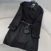 Chaquetas de mujer Diseñador 2023 Otoño Invierno Moda Solapa negra Abrigo largo Manga de mujer con bolsa de cinturón Streetwear Chaqueta de bolsillo Tren Abrigos 4M01