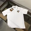 Summer klasyczny designerski designerka koszula polo Tops Man S zwykła klatka piersiowa koszula odzież polo rękawie Mężczyzn ubrania para duży rozmiar s-xl 3 kolor